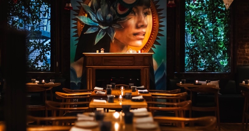 Dining area, mural above the fireplace