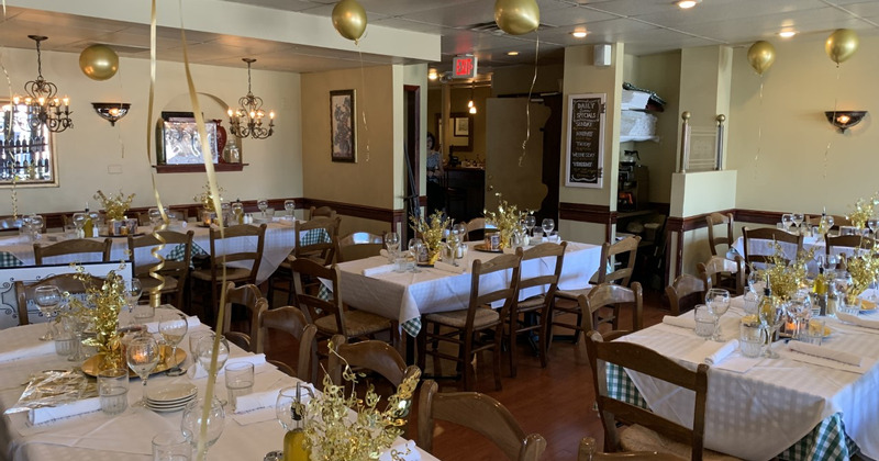 Restaurant interior, dining area with set dining tables