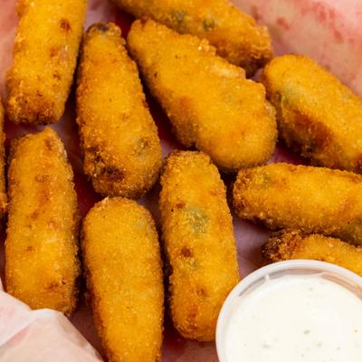 Potato Munchers with dip, closeup.