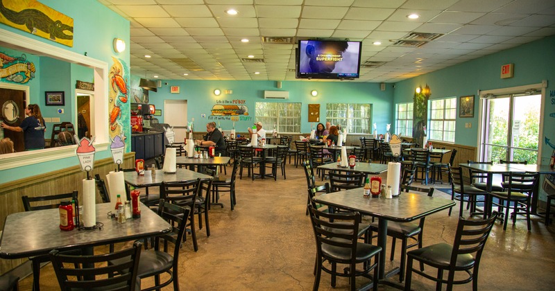 Interior, diner area, wide view, tables and chairs