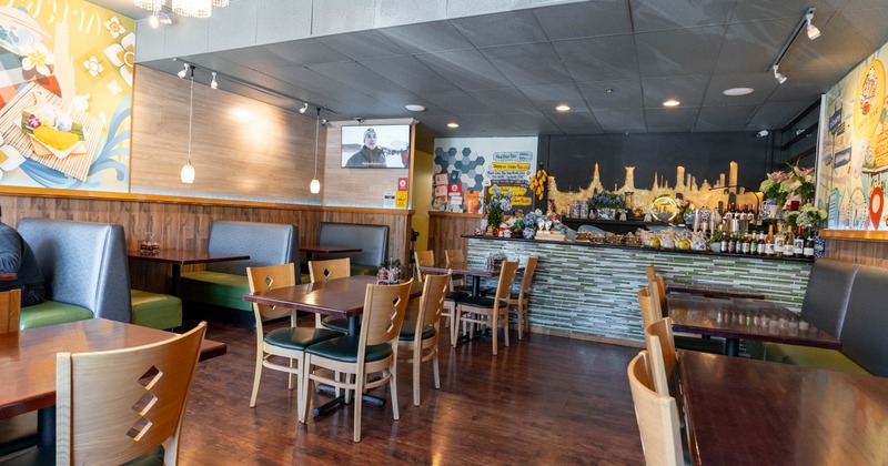 Interior, seating area with a bar in the back