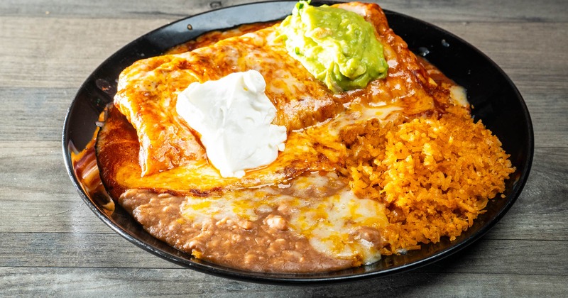 Creamy chimichanga with rice and refried beans