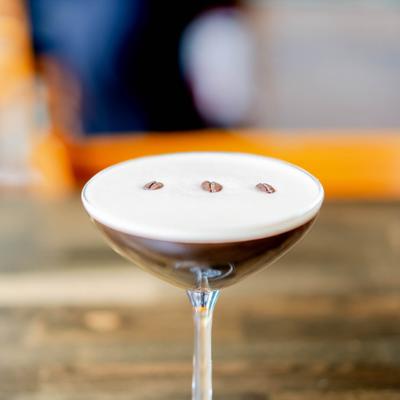 Espresso Martini cocktail garnished with coffee beans.