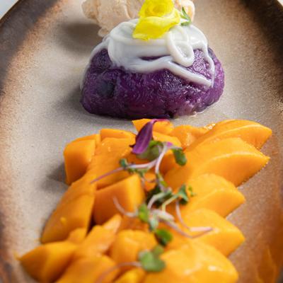 Mango with ice cream and ube sticky rice.