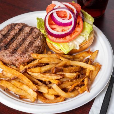 Burger served with fries.