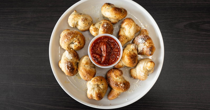 Garlic knots with a red sauce