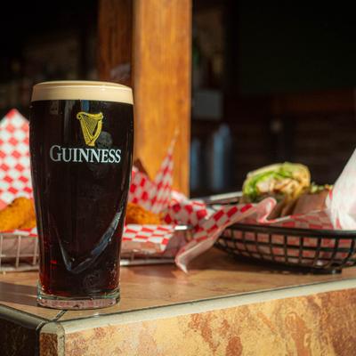 A glass of Guinness beer.