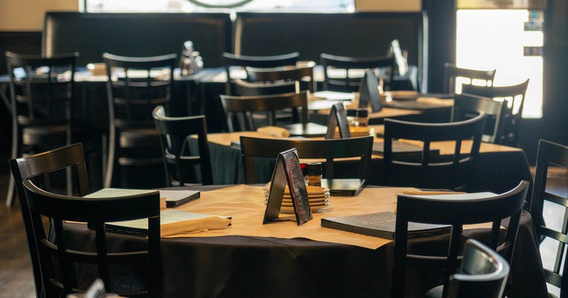 Interior, tables and chairs ready for guests