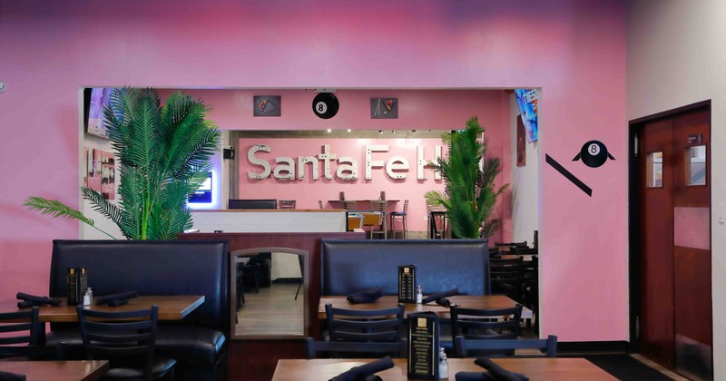 Interior, tables, chairs and black leather benches