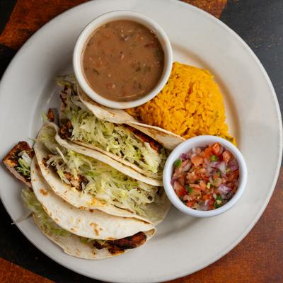 Soft Tacos - your choice of chicken , beef shrimp or jerk fish (regular or spicy).