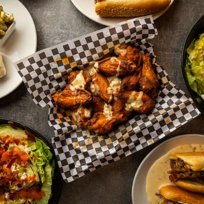 Wings, plate on a table, top view.
