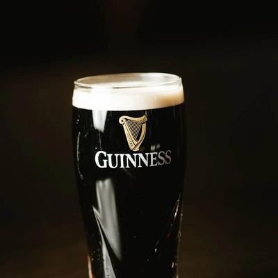 A glass of Guinness beer.
