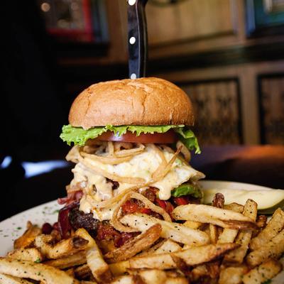Black & Bleu Burger with fries.