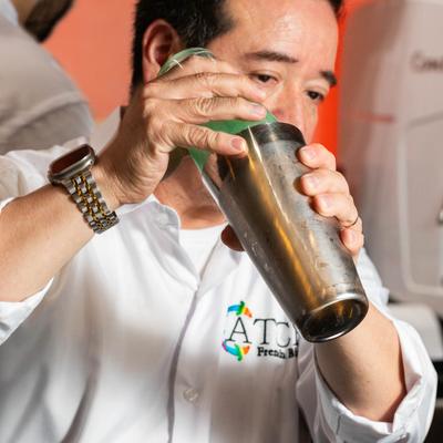 Bartender shaking a cocktail.
