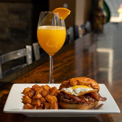 The breakfast burger and orange juice.