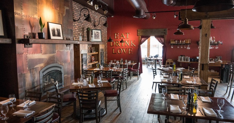 Interior, tables set for guests in dining area