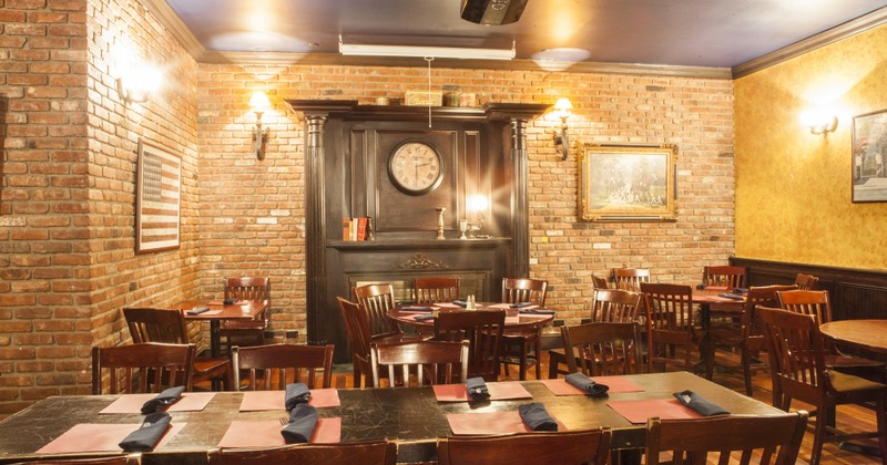 Interior, retro design, tables and seating with a fireplace