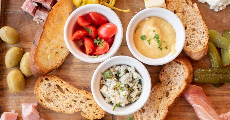 Cherry tomato, cheese, dip and snacks