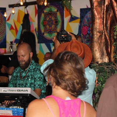 People at the bar during a music event.