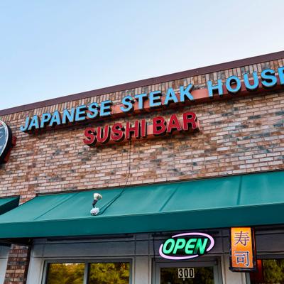 Restaurant sign above the front entrance.