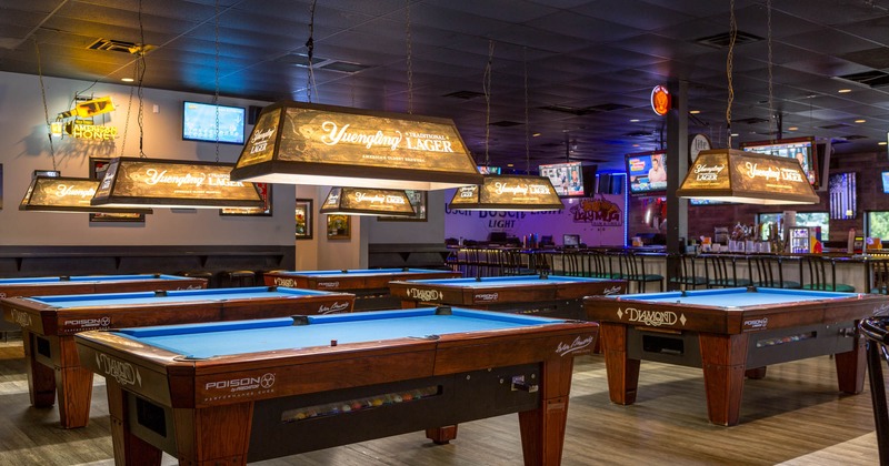 Interior, pool tables lined up
