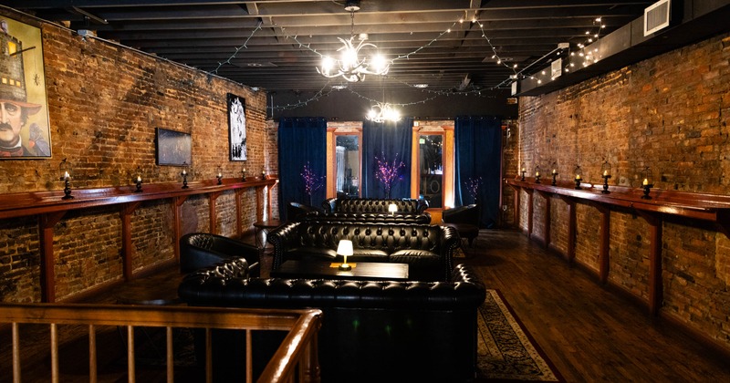 Lounge area, black leather sofas