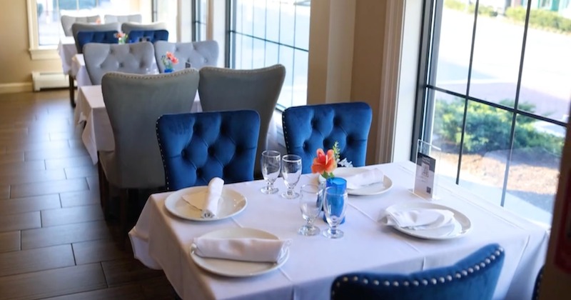 Dining tables, set for guests