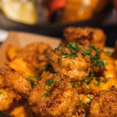 Chicken Tenders garnished with herbs, close-up.