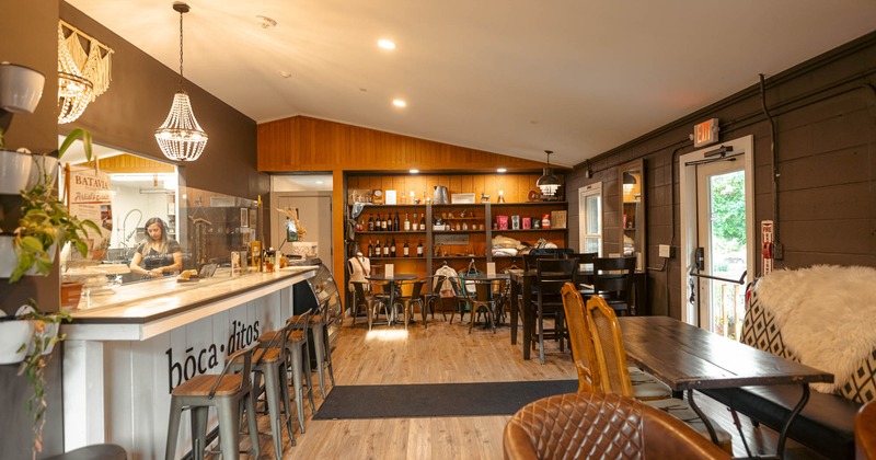 Interior, seating area with bar on left