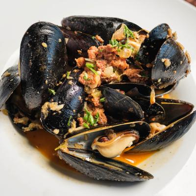 Served mussels in the plate.