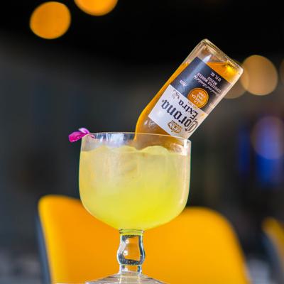 Coronarita cocktail with an upside-down beer bottle.