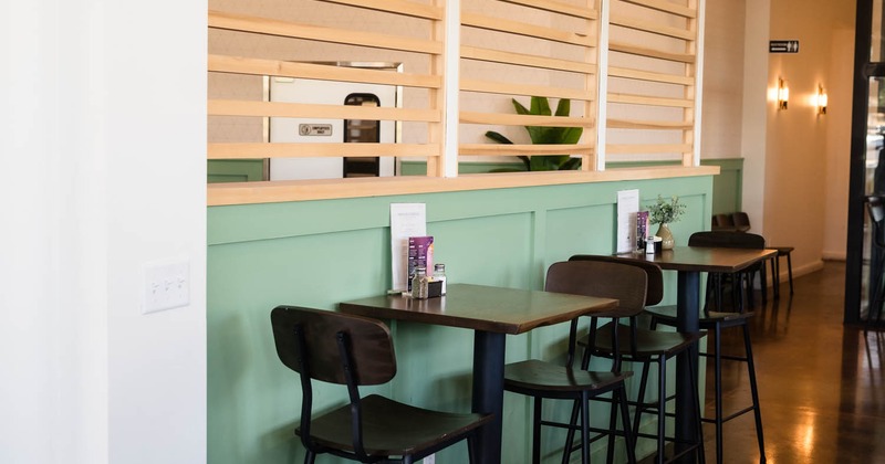 Interior, tall tables for two people