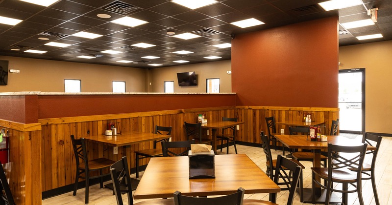 Interior, tables and chairs ready for guests