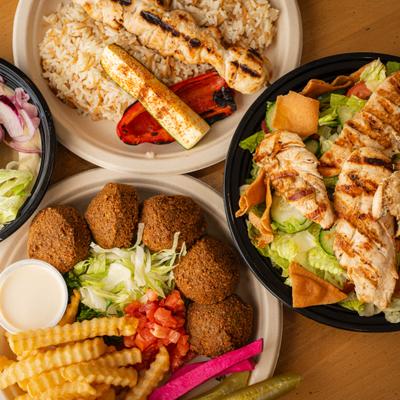 A variety of dishes placed on a table, top view.