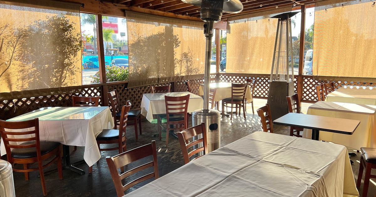 Exterior, patio area with tables and chairs