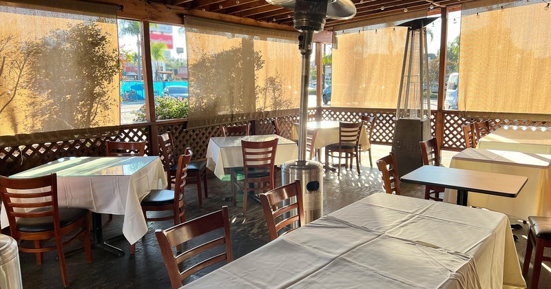 Exterior, patio area with tables and chairs