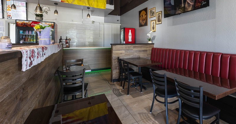 Interior, tables, chairs and seating booths ready for guests