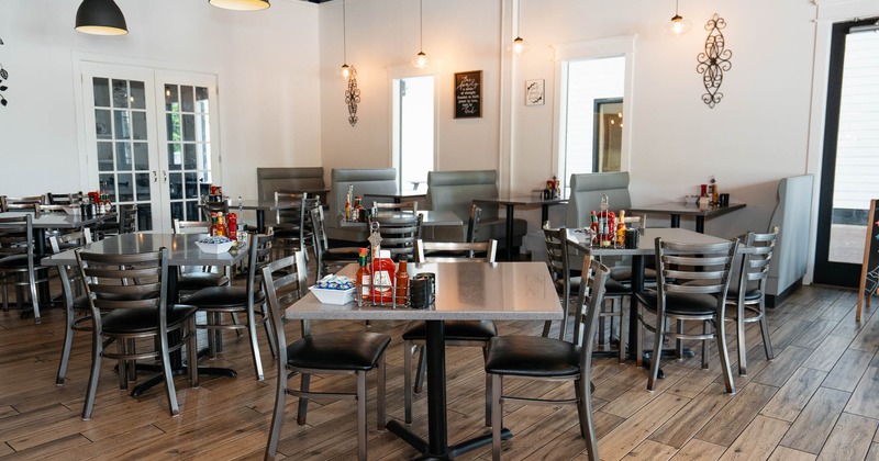Interior, dining area with tables and chairs