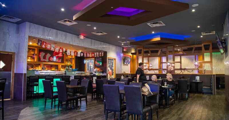 Interior, seating area with a few guests at the tables