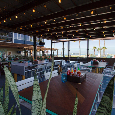 Roofed exterior seating area, view of the ocean