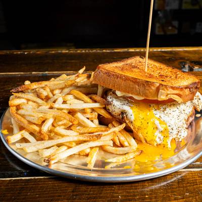 Thick Cut Bologna Sandwich with fries.