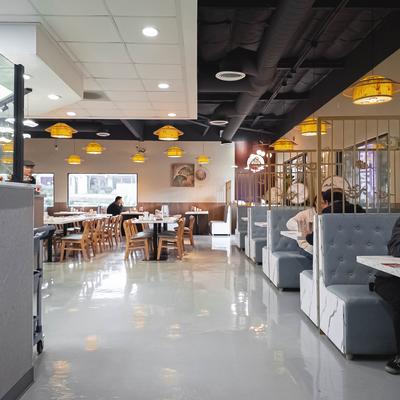 Interior with both booth seating and traditional tables and chairs.