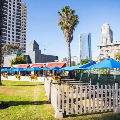 Seating area surrounded by a fence.