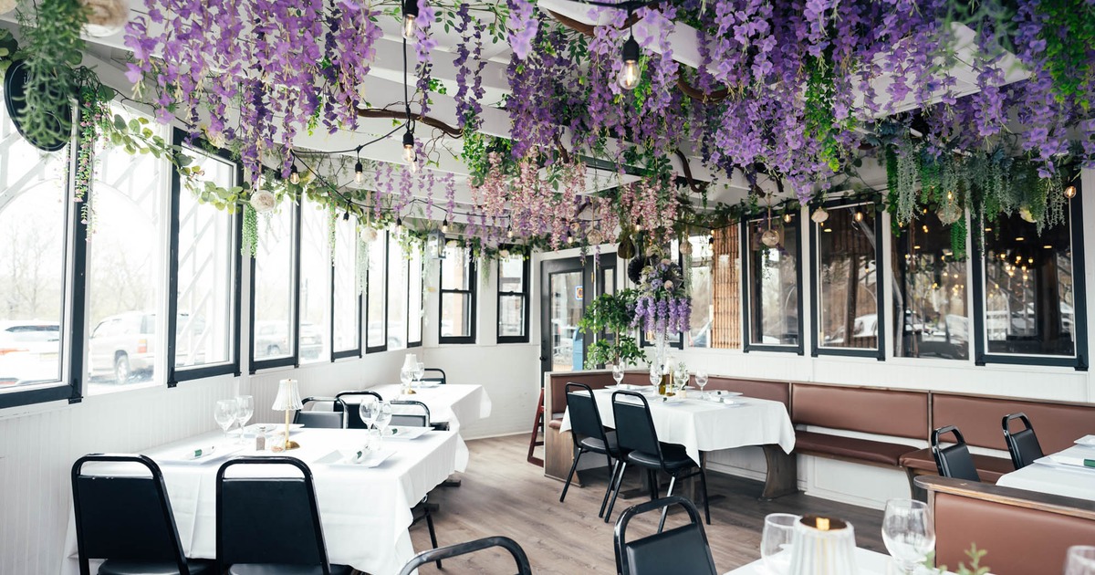 Inside, tables, chairs, tableware, floral decoration