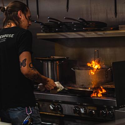 Kitchen staff cooking food