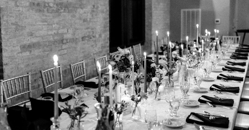 A beautifully set long banquet table