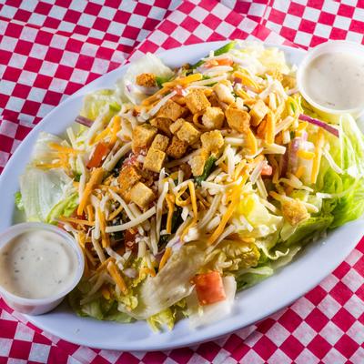 House Caesar salad with dips on the side