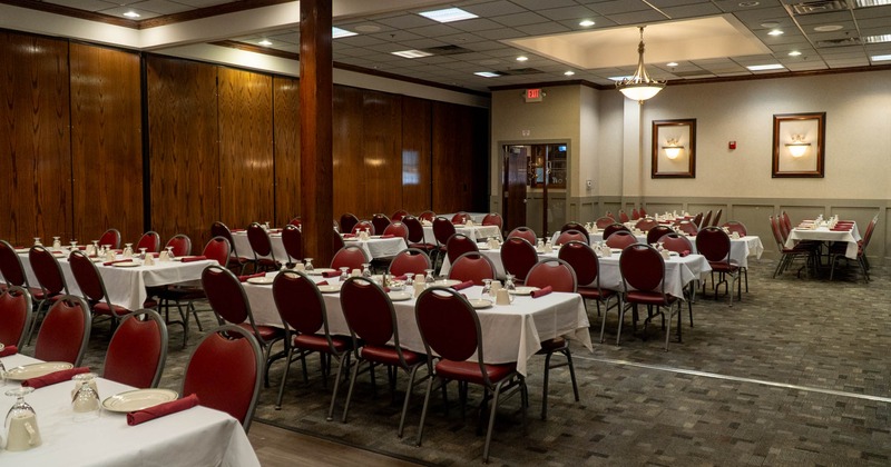 Interior, seating area, tables ready for guests