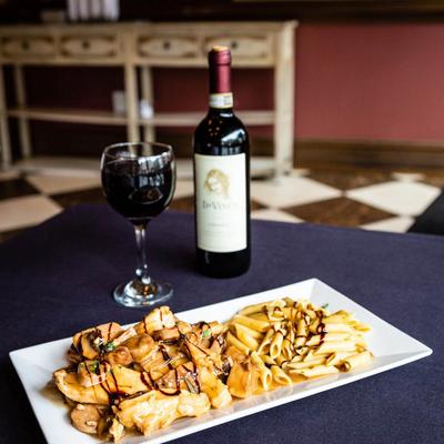 Chicken Scarpariello and red wine.