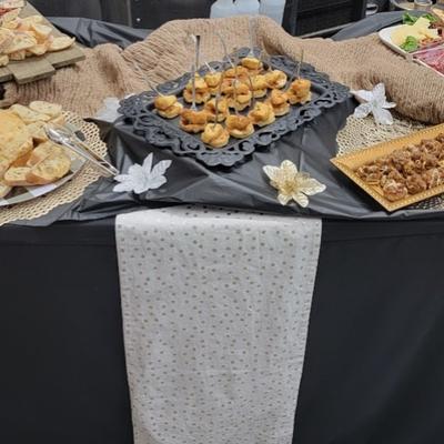 Appetizer dishes on a buffet table.
